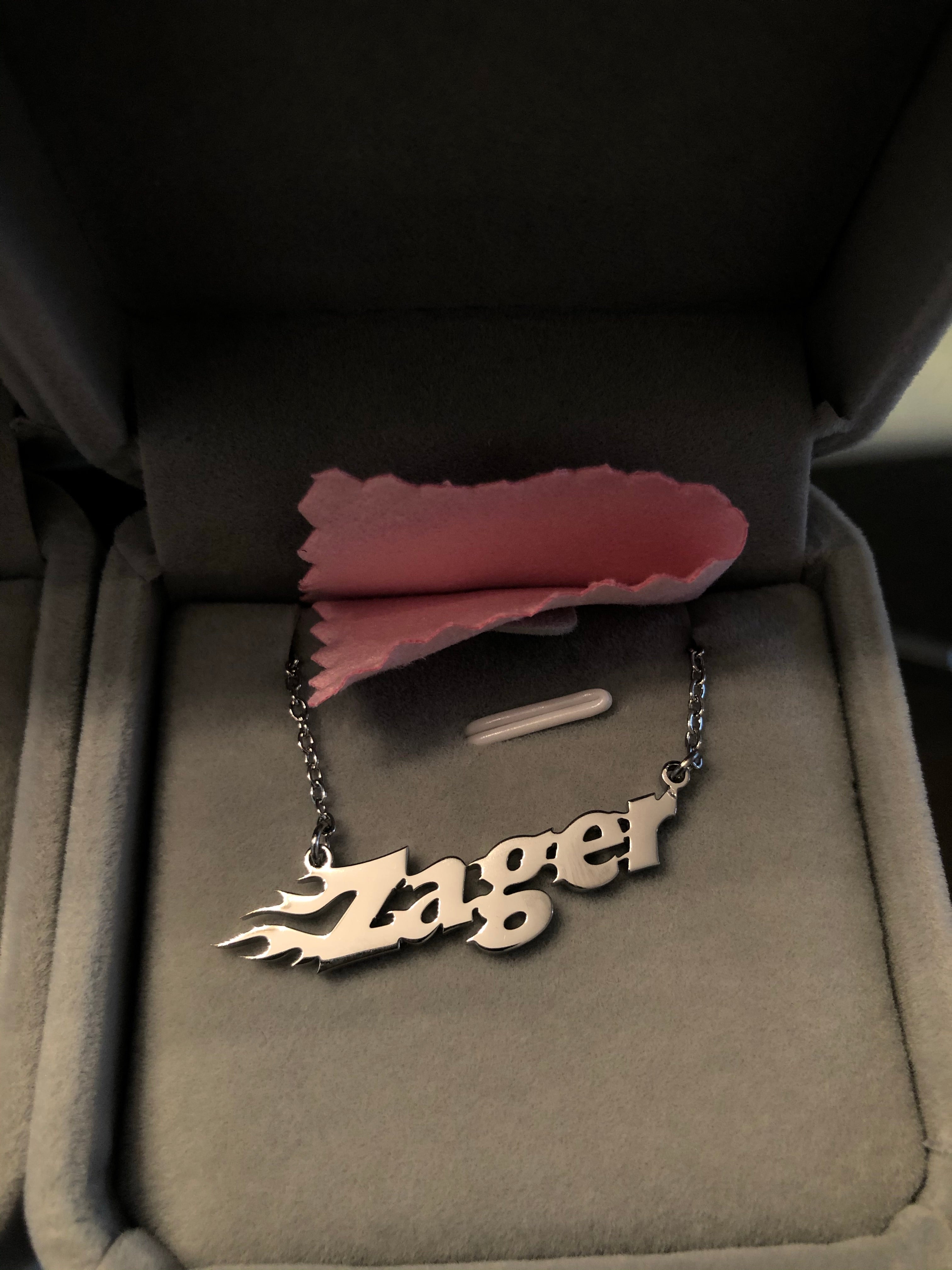 Custom silver flame name necklace